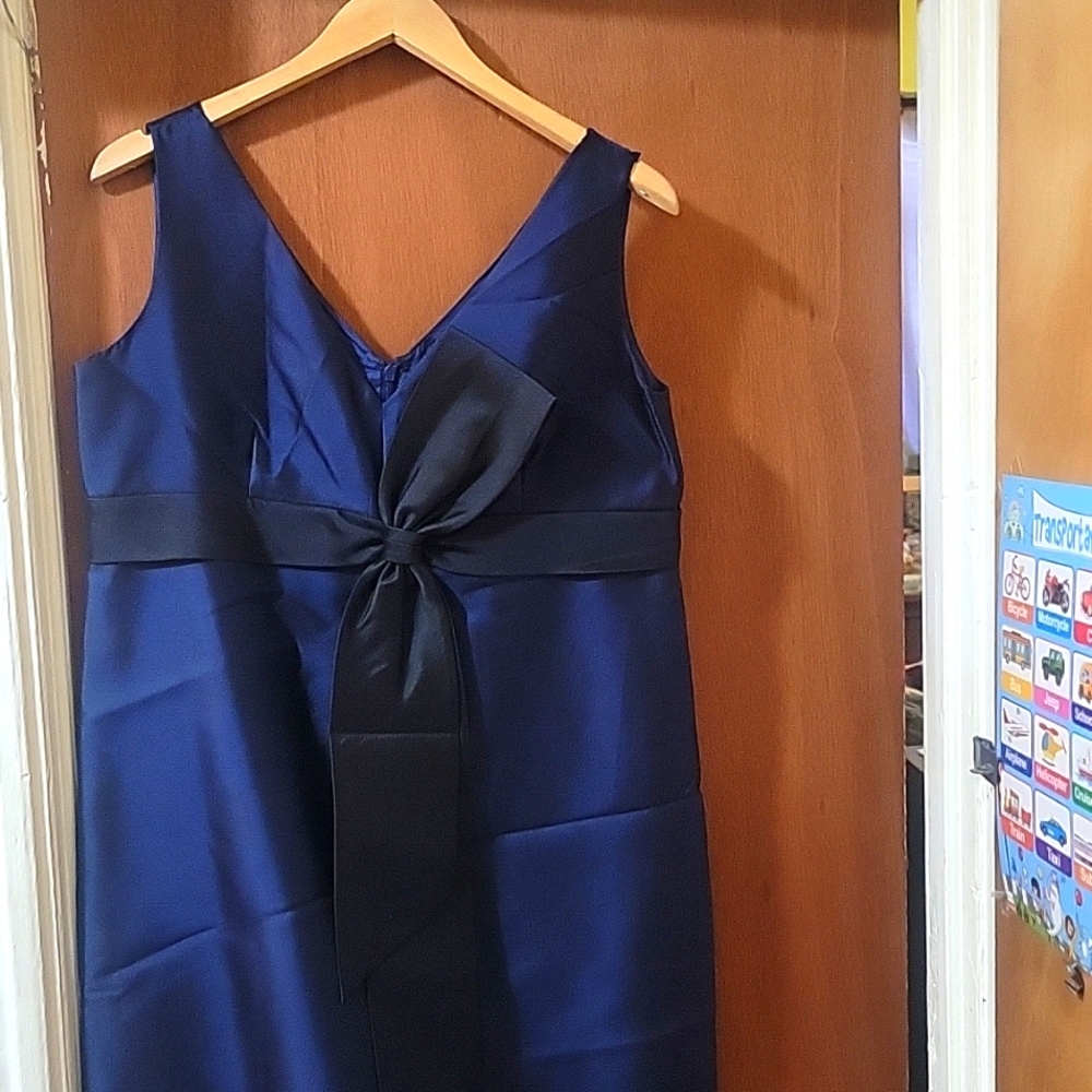 Tory Burch dress knee length.